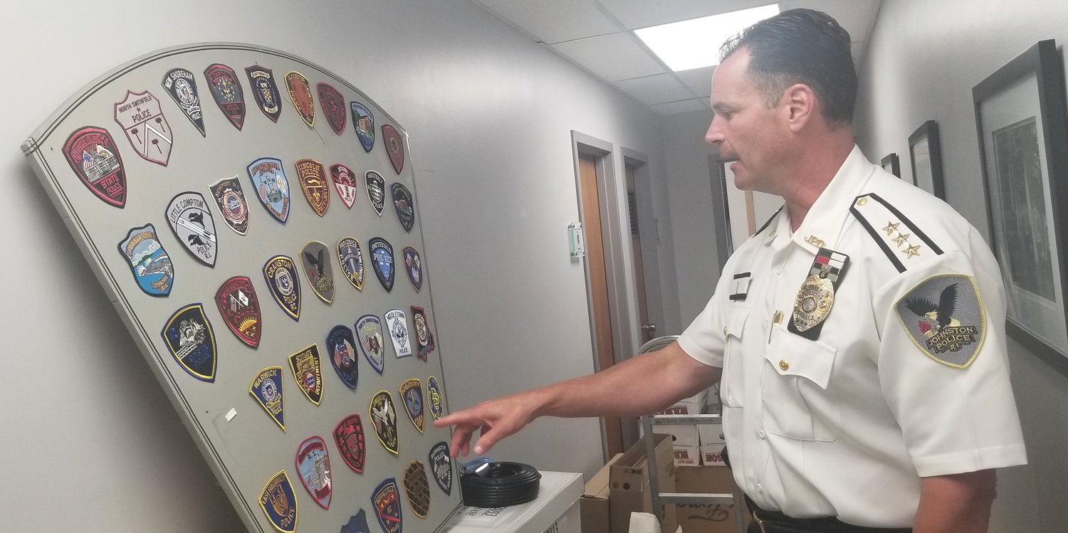 EVERY DEPARTMENT: Last year, Johnston Police Chief Joseph P. Razza referred to a collection of patches from every department in the Ocean State as he discussed a new program aimed at equipping all of Rhode Island’s front-line police officers with body-worn cameras. Razza's death was announced Friday, Sept. 29, 2023. He was 54 years old.